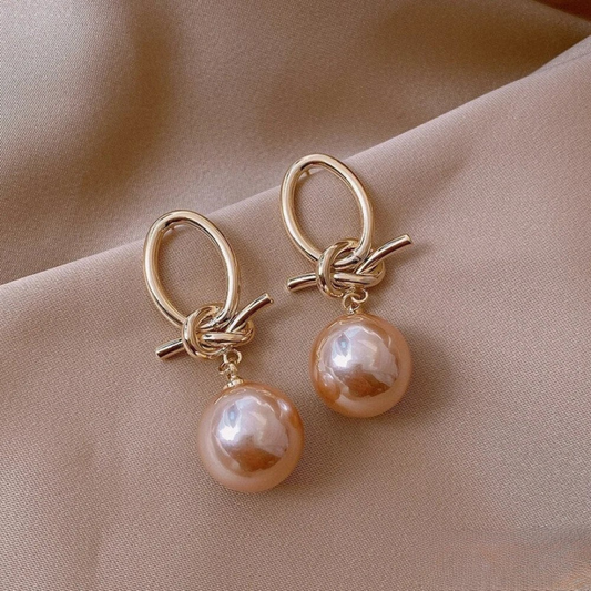 Orecchini d'oro con perla