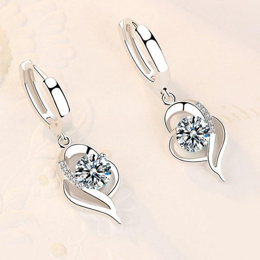 Orecchini a bottone floreali in argento con zirconia