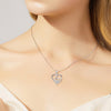 Collana d'argento con impronta di zampa e cuore in zirconi