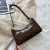 Tilly™ | Borsa a spalla lucida con motivo alligatore