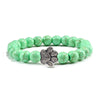 Bracciale con zampa decorato con perline di pietre naturali