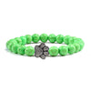 Bracciale con zampa decorato con perline di pietre naturali