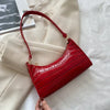 Tilly™ | Borsa a spalla lucida con motivo alligatore