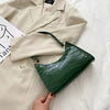 Tilly™ | Borsa a spalla lucida con motivo alligatore