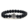 Bracciale con zampa decorato con perline di pietre naturali