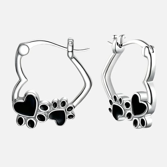 Orecchini huggie con cuore e smalto nero