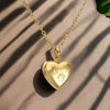 Collana commemorativa con ciondolo a forma di cuore e zampa