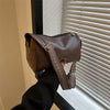 Trine™ | Borsa a tracolla vintage in pelle con tracolla regolabile intrecciata