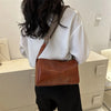 Trine™ | Borsa a tracolla vintage in pelle con tracolla regolabile intrecciata