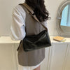 Trine™ | Borsa a tracolla vintage in pelle con tracolla regolabile intrecciata