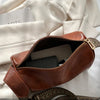 Trine™ | Borsa a tracolla vintage in pelle con tracolla regolabile intrecciata
