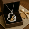 Collana d'argento con cuore, motivo cane e zirconi