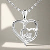 Collana d'argento con impronta di zampa e cuore in zirconi