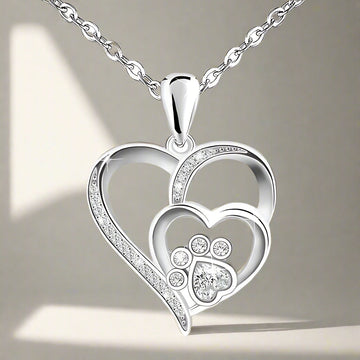 Collana d'argento con impronta di zampa e cuore in zirconi