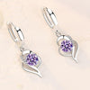 Orecchini a bottone floreali in argento con zirconia